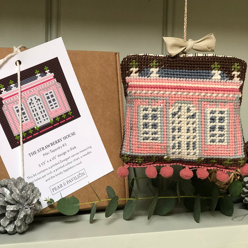 tapestry kit in small size showing the strawberry house in pink and box
