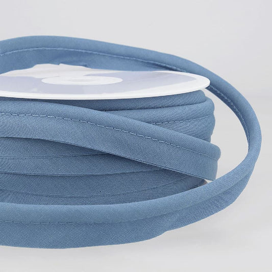 Spool of piping cord in china blue.