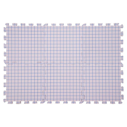 A set of blocking mats linked together on a white surface.