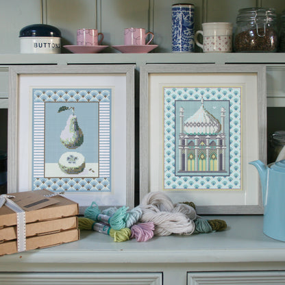 The Pear and Pavilion framed on the dresser.